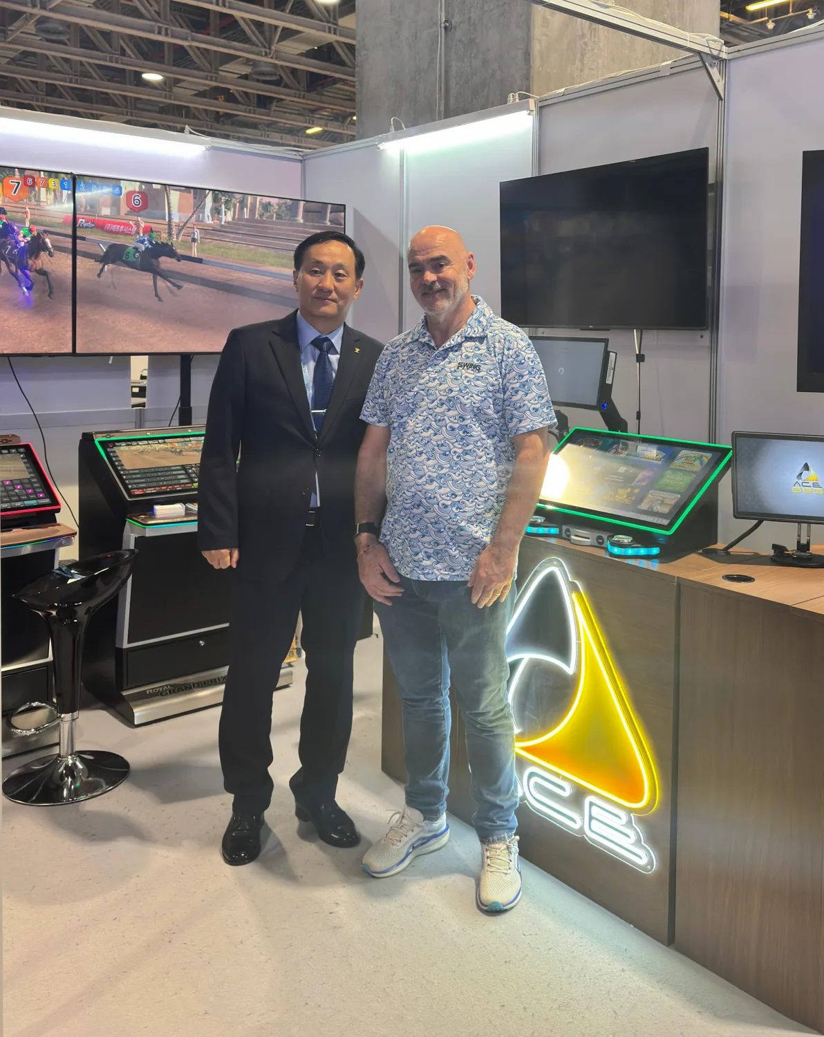 F2 System and ACE Systems CEOs at the Royal Grand Prix Derby 3 stand, G2E Asia 2026